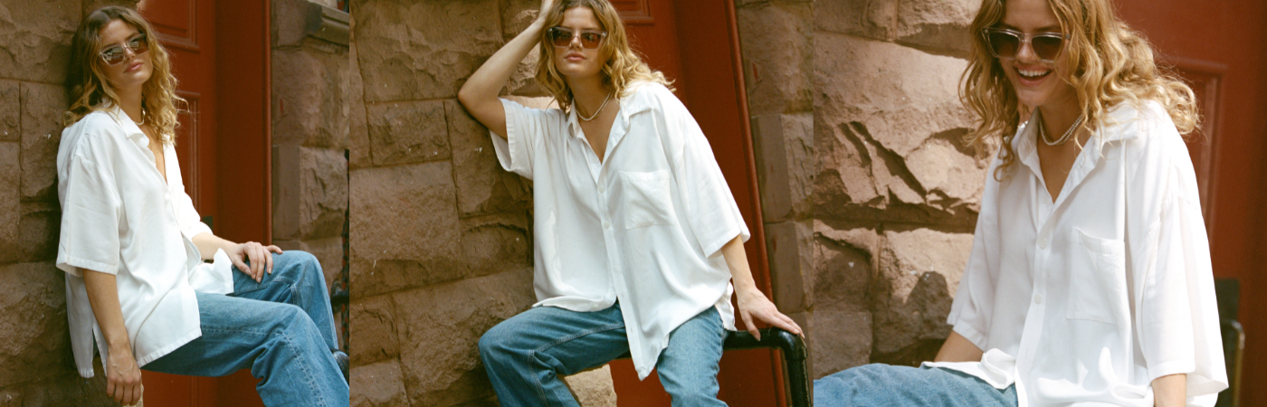 Rhodin resort wear collection - lady wearing white resort shirt and jeans