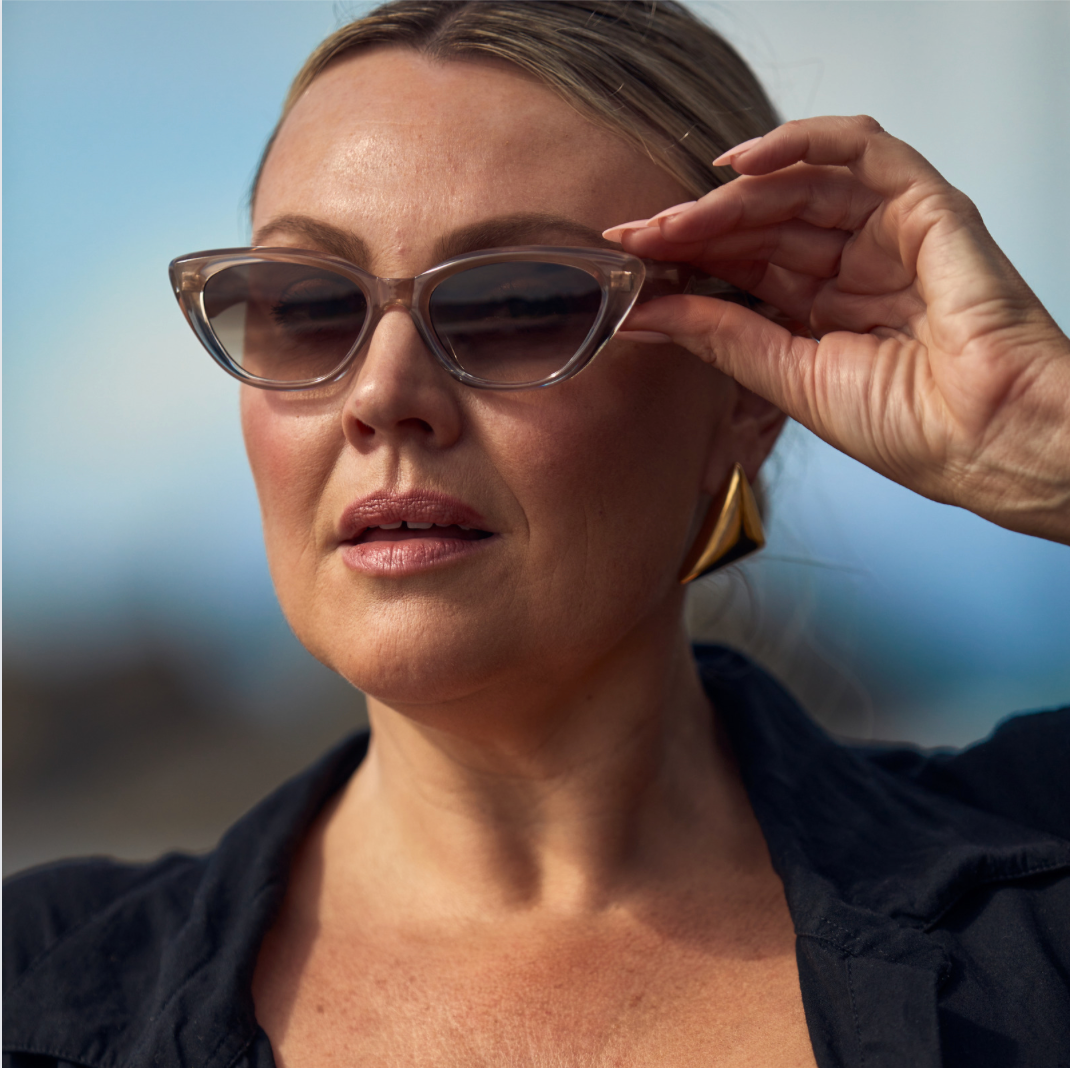 Lady with sunglasses and earrings - Shop the Look Our most popular looks of the season